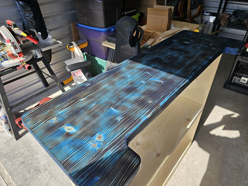 Bar top with blue stain wiped