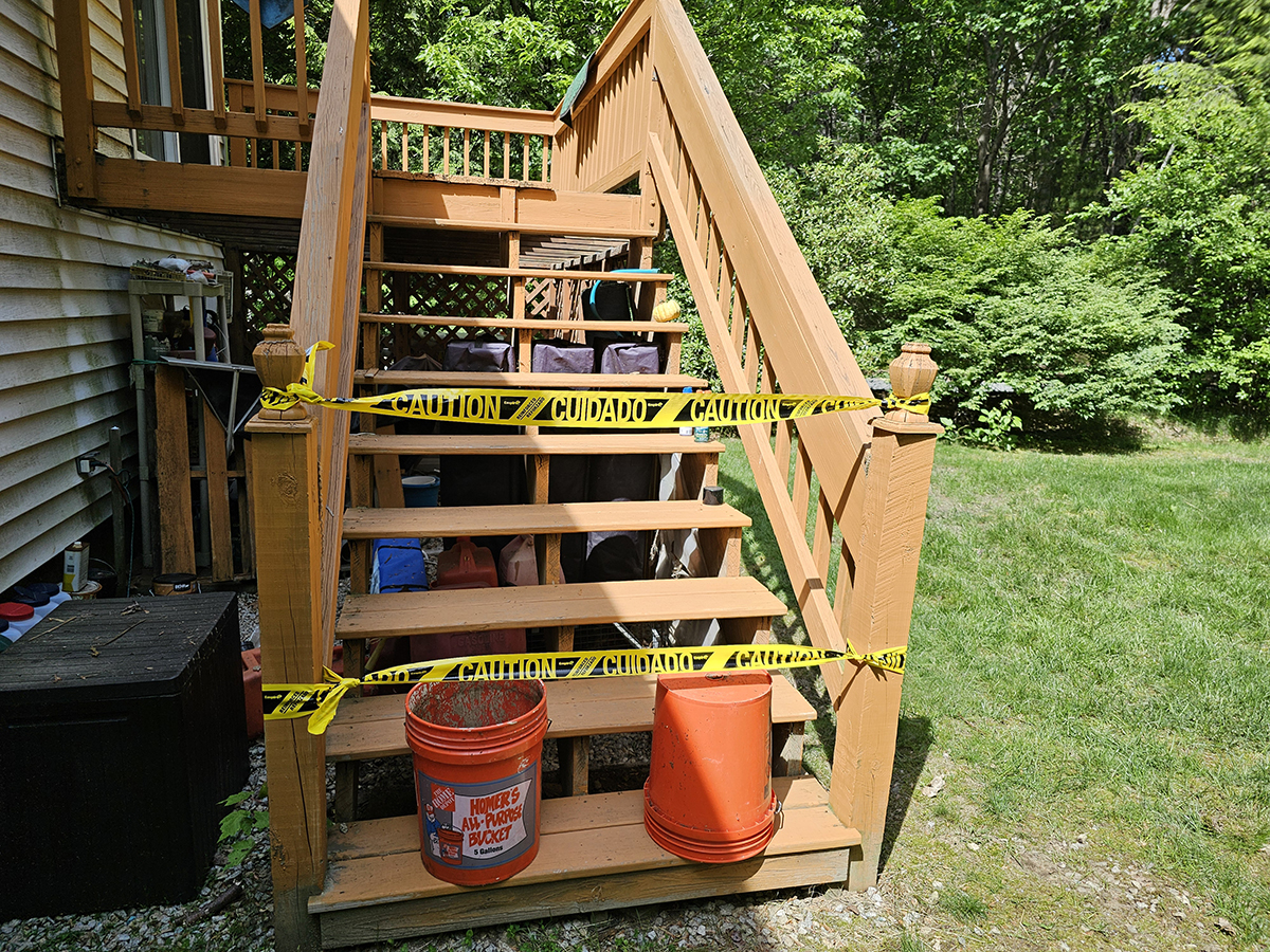 Exterior deck access blocked with caution tape
