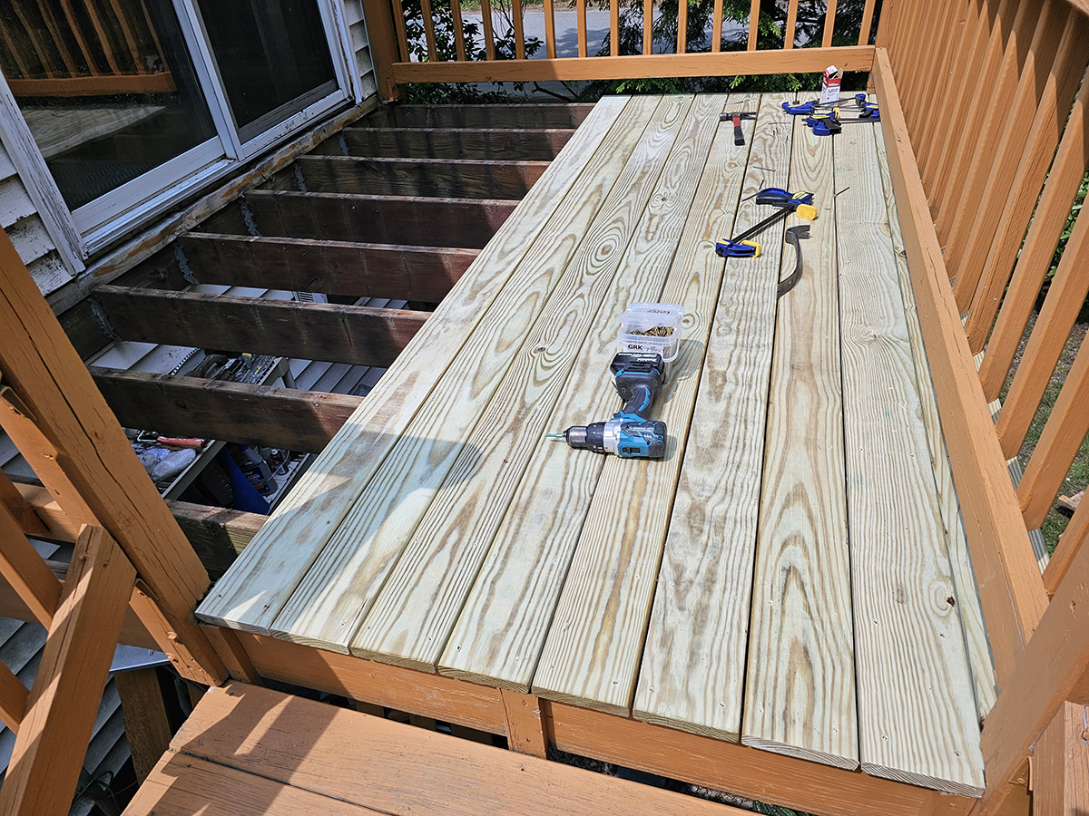 Half of the new deck boards installed