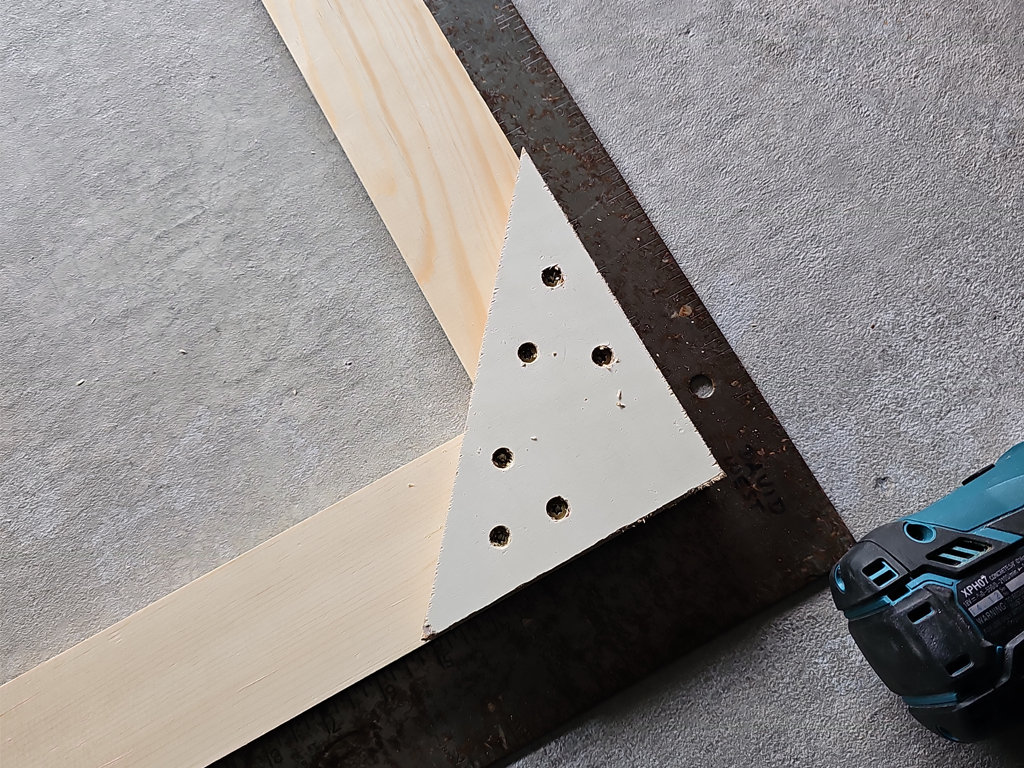 Wooden Frame Corner Reinforced with Plywood Brace