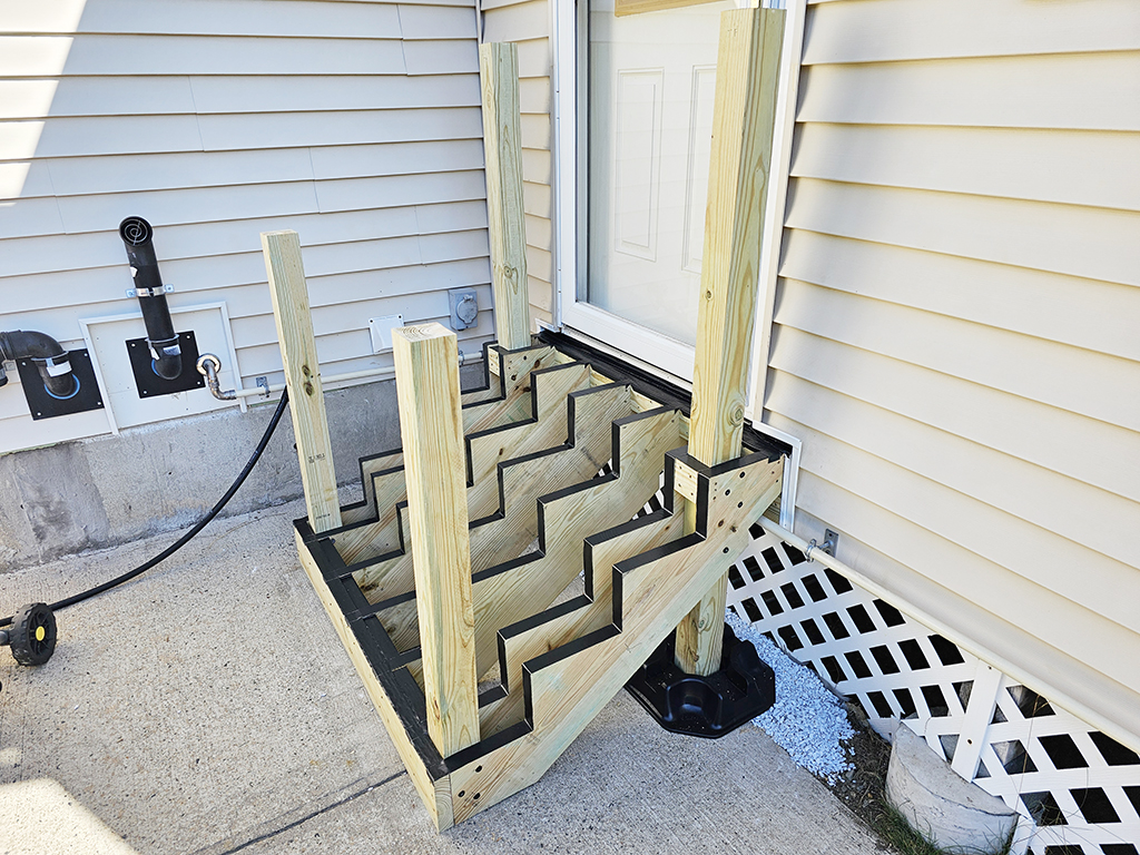 Framed Stair Structure with Joist Tape Applied for Moisture Protection